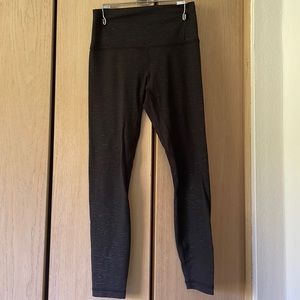 Lululemon black aligns with dotted print 25”